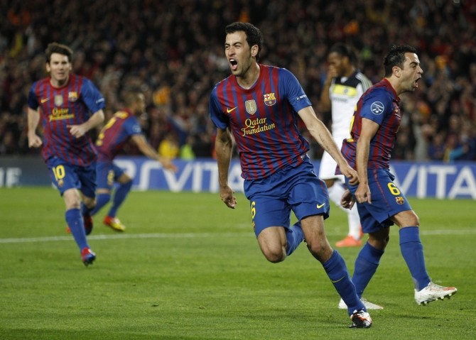 Barcelona's Busquets celebrates after scoring against Chelsea during their Champions League soccer semi-final in Barcelona