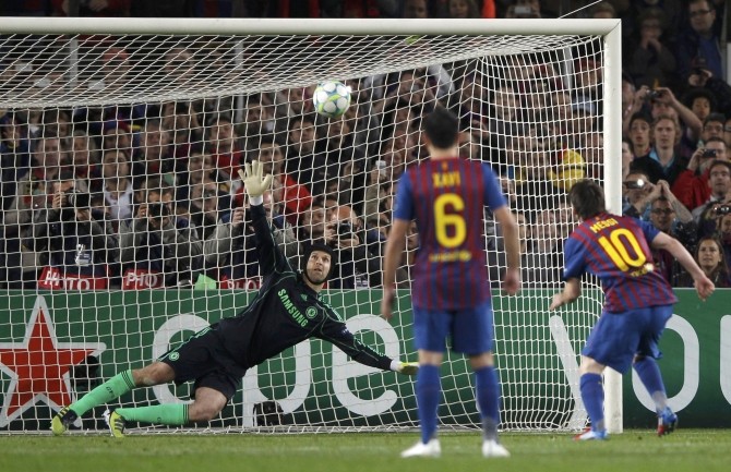 Barcelona's Lionel Messi takes a penalty kick and fails to score during their Champions League semi-final second leg soccer match against Chelsea at Camp Nou stadium in Barcelona