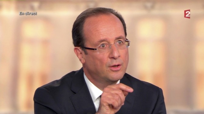 Hollande, Socialist party candidate for the 2012 French presidential elections, is seen in this video grab from France 2 Television, during a televised debate in La Plaine Saint-Denis