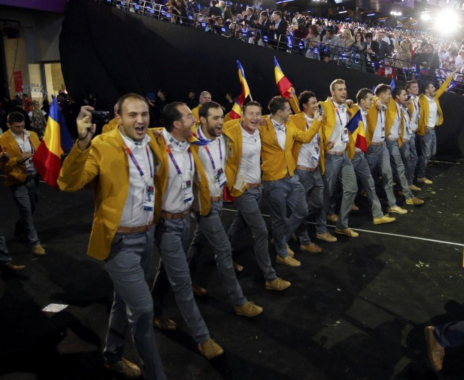 Romania's contingent takes part in the athletes parade during the opening ceremony of the London 2012 Olympic Games at the Olympic Stadium