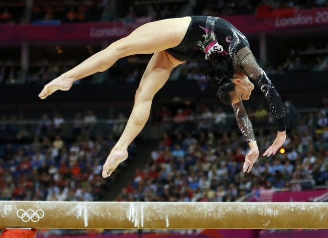 Romania's Catalina Ponor competes in the women's gymnastics balance beam final in the North Greenwich Arena during the London 2012 Olympic Games