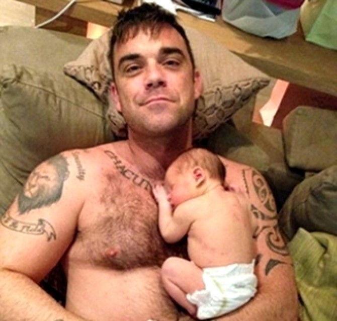 Robbie Williams impreuna cu fiica sa