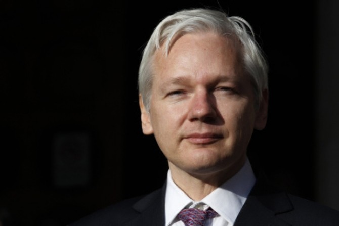 WikiLeaks founder Julian Assange speaks to the media outside the High Court in London