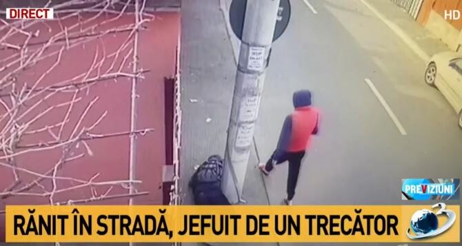 Un bărbat căzut pe stradă, inconștient, jefuit de un tânăr / Captură Antena 3