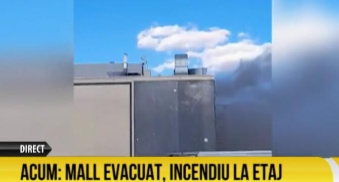 Incendiu într-un mall din Capitală. Sute de oameni, evacuați de urgență / Foto: Captură video România TV