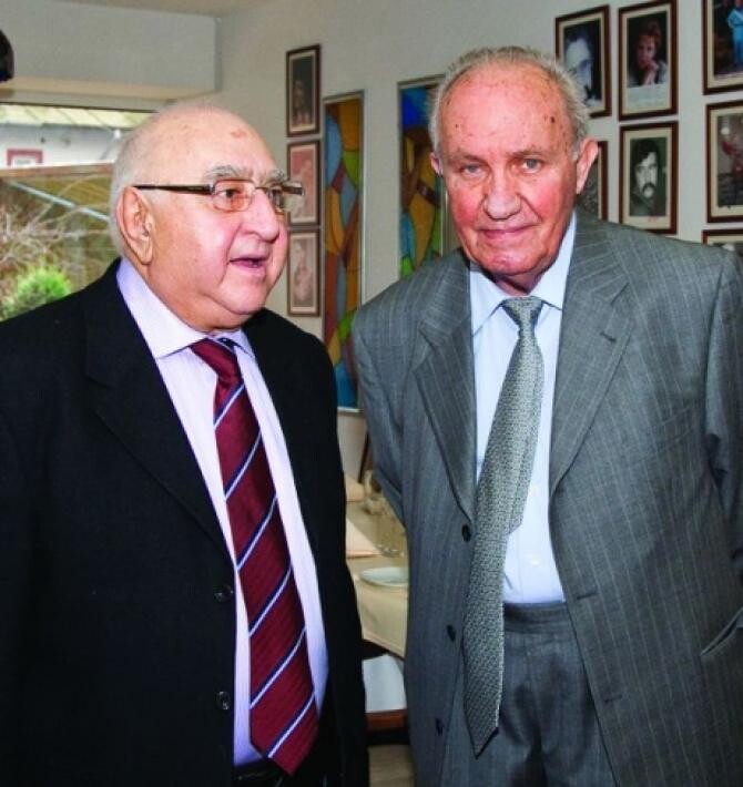 Scriitorul Dinu Săraru, alături de istoricul Dinu C. Giurescu